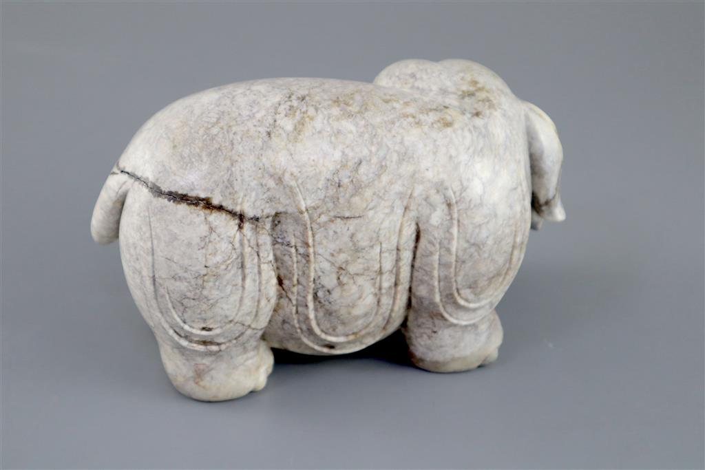 A Chinese burnt jade figure of an elephant, 15.5cm long